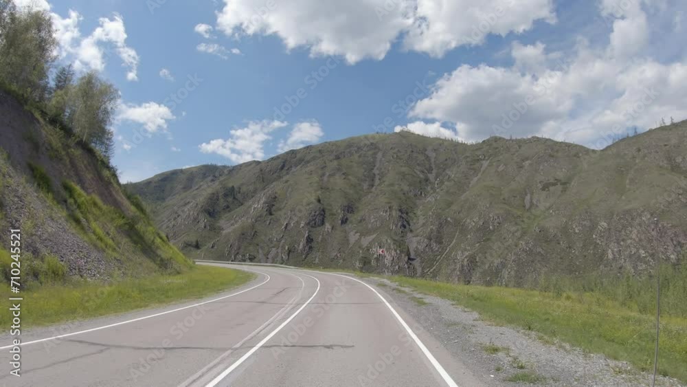 Video of driving in a car In summer season along the mountain road in Altai. Video of driving in a car In summer season along the mountain road in Altai.