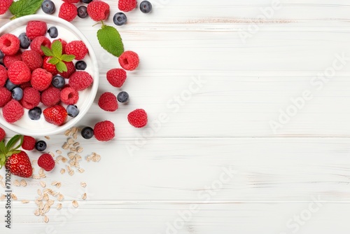 Yogurt muesli and berries on white background Fresh and healthy Top view flat lay Copy space