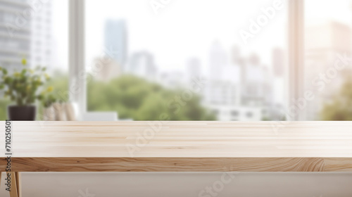 white wood top table over office blurred background © Aura