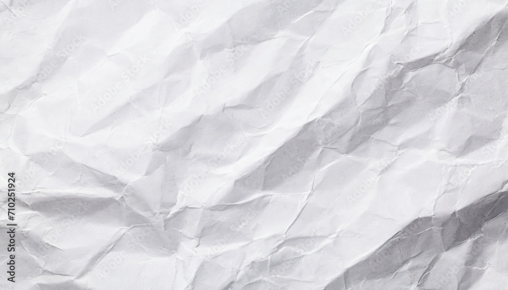 Obraz premium The white crumpled paper background.