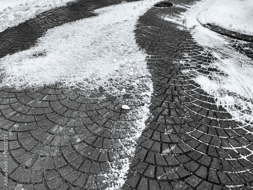 Εκτύπωση καμβά stone tiles sidewalk, cleared from snow after snowfall.