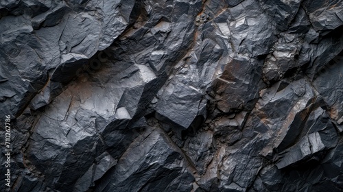 Rock texture background. dark black rough mountain surface. textured stone background with space for design