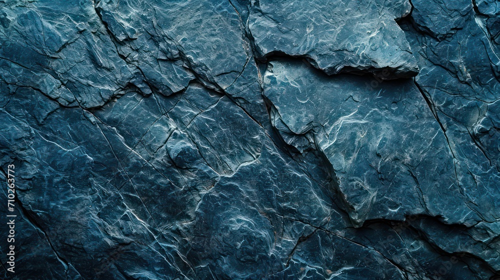 Rock texture background. dark blue rough mountain surface. textured stone background with space for design