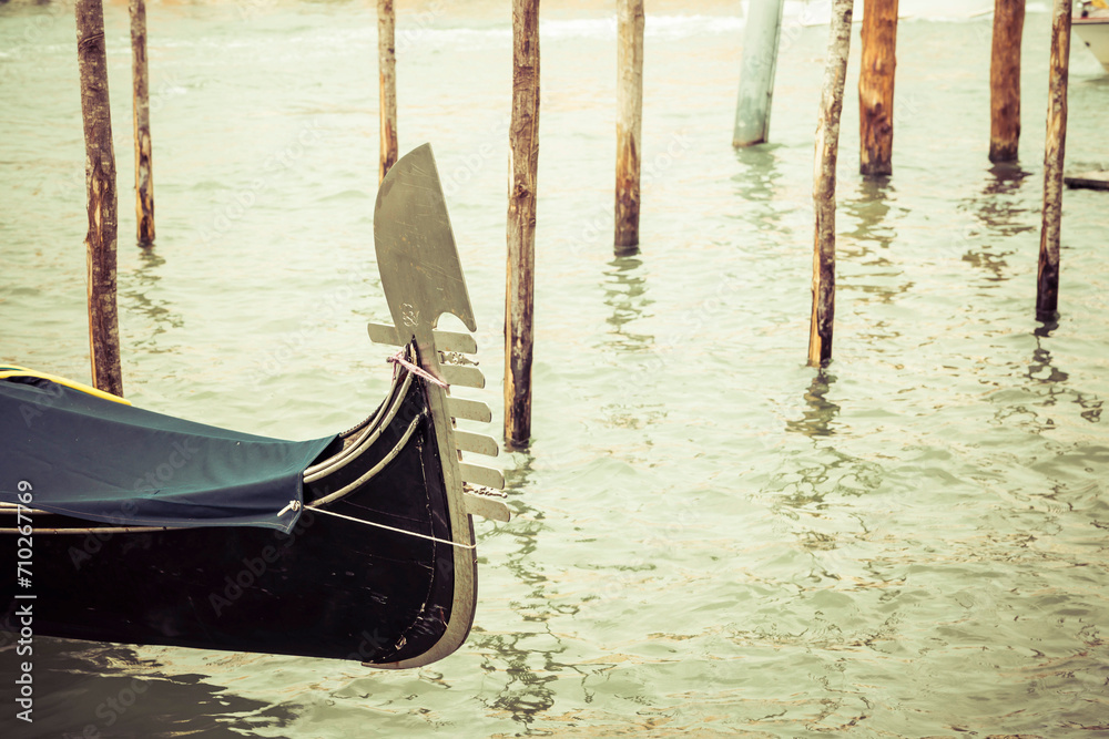 The bow of a gondola in the city of Venice, Italy.