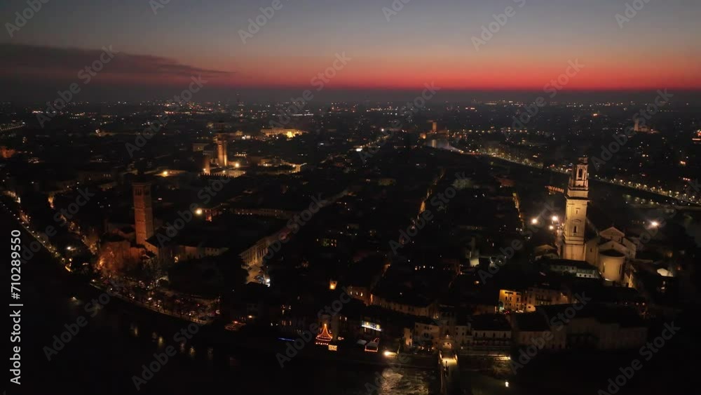 Aerial Rotating anti-clockwise Drone Shot, of Verona City Center At Night with Sunset Aerial Rotating anti-clockwise Drone Shot, of Verona City Center At Night with Sunset
