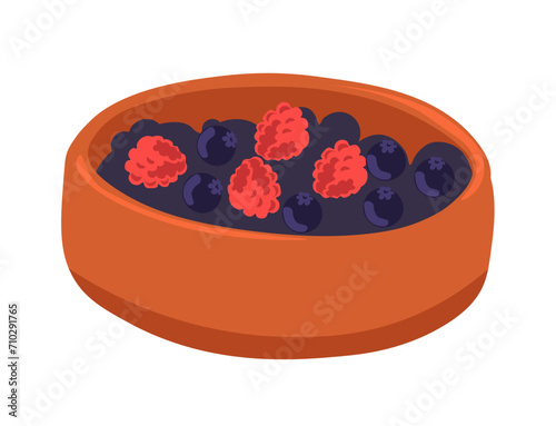 Bowl with fresh berries, raspberry and blueberry