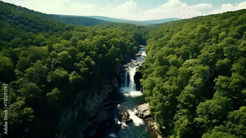Arial shot of falls in a beautiful green forest , aerial shot, falls, beautiful green forest