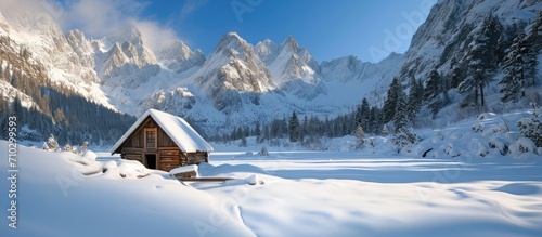 Winter scenery and shelter in 5 lakes valley, High Tatras, Poland. photo