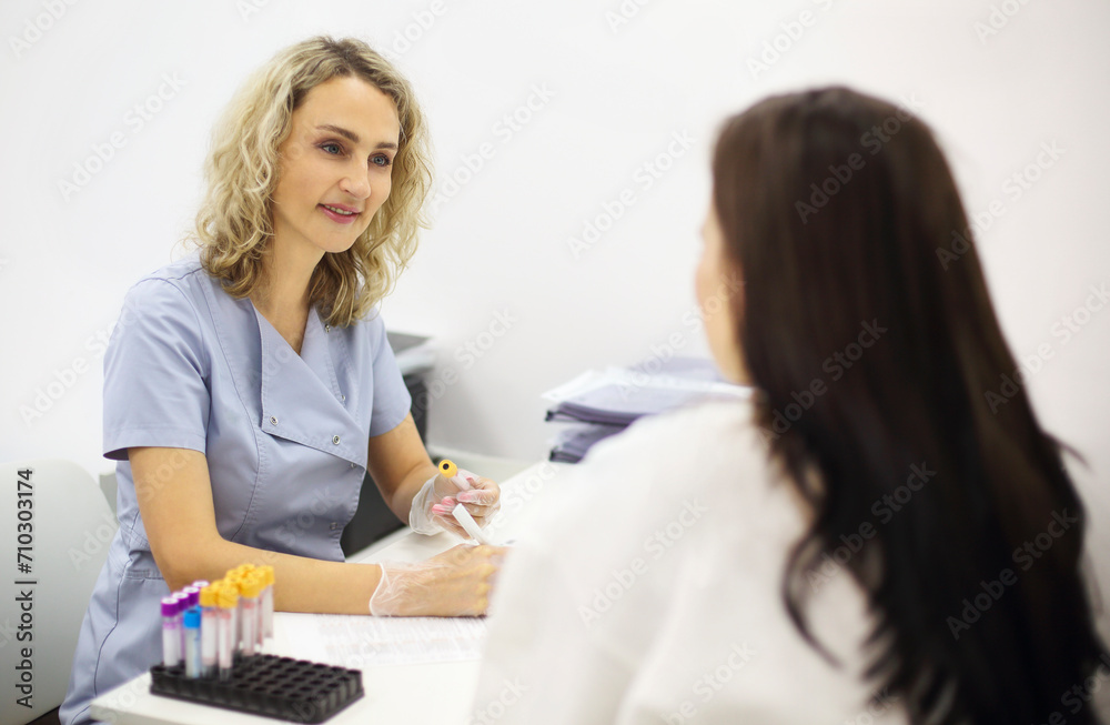 Young patient during blood test sampling procedure Young patient during blood test sampling procedure