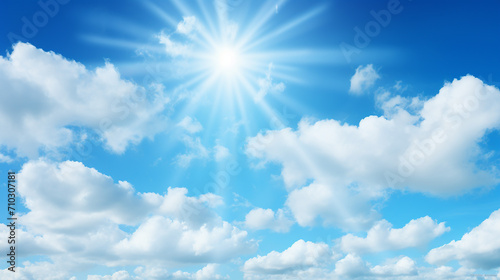 sunny background blue sky with white clouds and sun