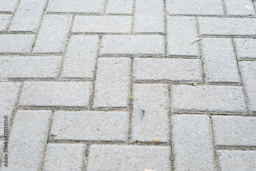 Gray stone tile block background with horizontal texture of gray brick. Gray brick surface