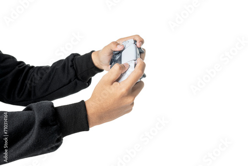 Gamer hand using video game console controller