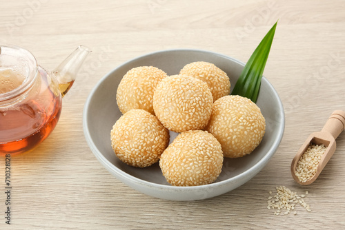 Onde-Onde, Indonesian traditional food, made from glutinous rice flour with beans pasta, wrapped in sesame seeds.
 photo