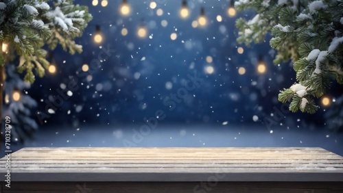 Empty Wood table top with decorative outdoor string lights hanging on tree in the garden at night time, winter time
