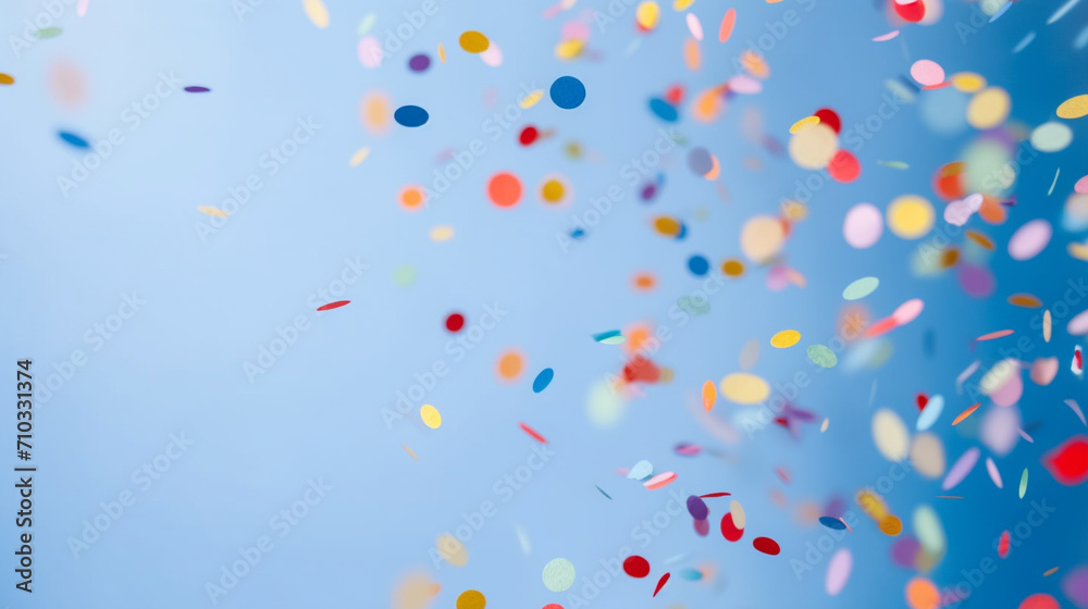 Colorful confetti flying in the air against a blue background, Generative AI Colorful confetti flying in the air against a blue background, Generative AI