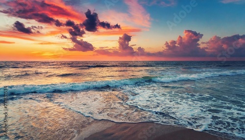 Colorful sky over the ocean, sunset, beautiful seascape to the horizon.
