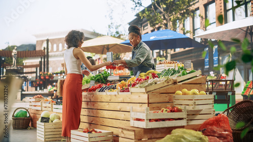 Tableau sur toile Young Beautiful Customer Shopping for Fresh Organic Vegetables for a Fresh Salad with Tomatoes and Cucumbers