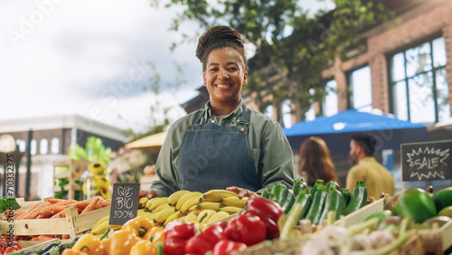 Canvas Print Portrait of a Multiethnic Middle Aged Female Managing a Street Vendor Food Stand with Fresh Organic Agricultural Products