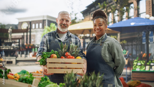 Diverse Female and Male Business Partners Posing for a Portrait, Looking at Camera and Smiling. Old-Time Friends Managing a Successful Organic Farmers Market Marketplace with Natural Farm Produce  photo