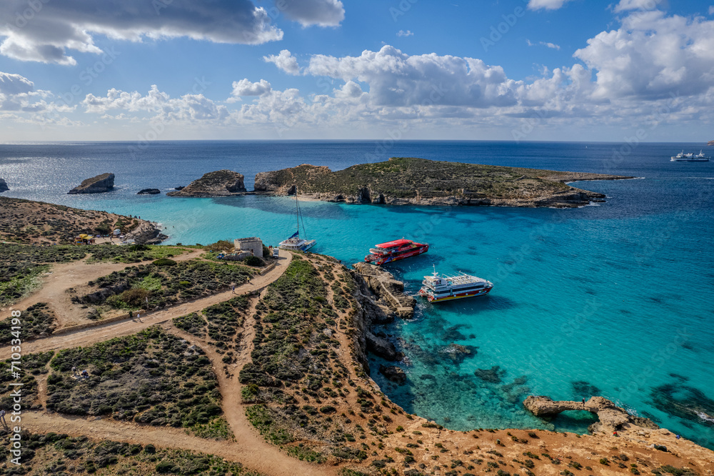 Aerial drone beautiful sunny view of Blue Lagoon in Comino Island, Gozo Island, Malta