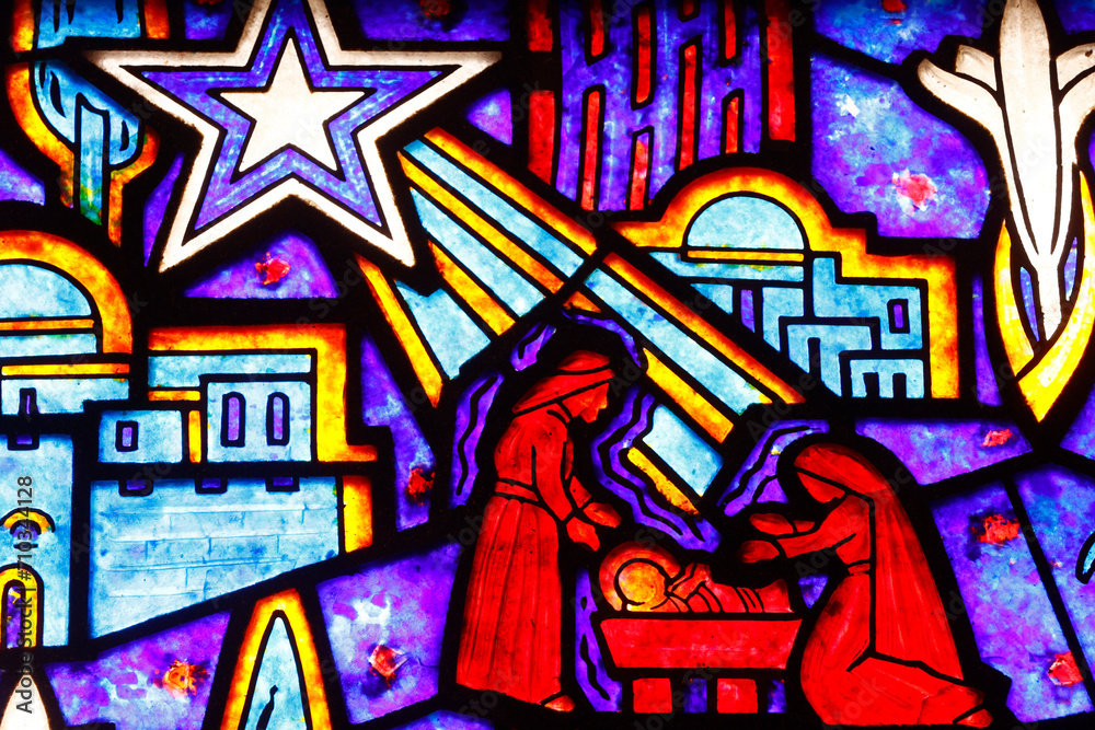 Saint Helier church. Stained glass.  Nativity of Jesus or birth of Christ. The nativity is the basis for the Christian holiday of Christmas on December 25.  Bleuzeville. France.
