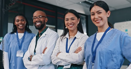 Happy, doctors and group with arms crossed in hospital with confidence in medical goals or mission. Healthcare, team and portrait of people in clinic working in medicare with pride and diversity photo