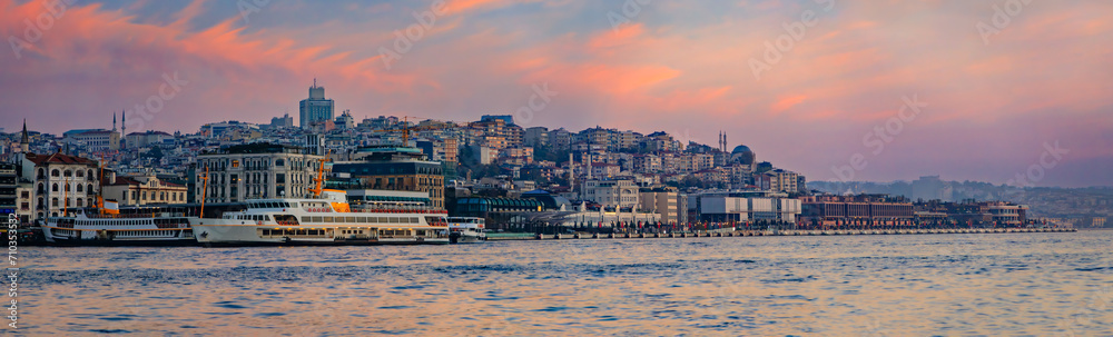 Karakoy, Galata Port across the Bosphorus Strait at sunrise in Istanbul, Turkey