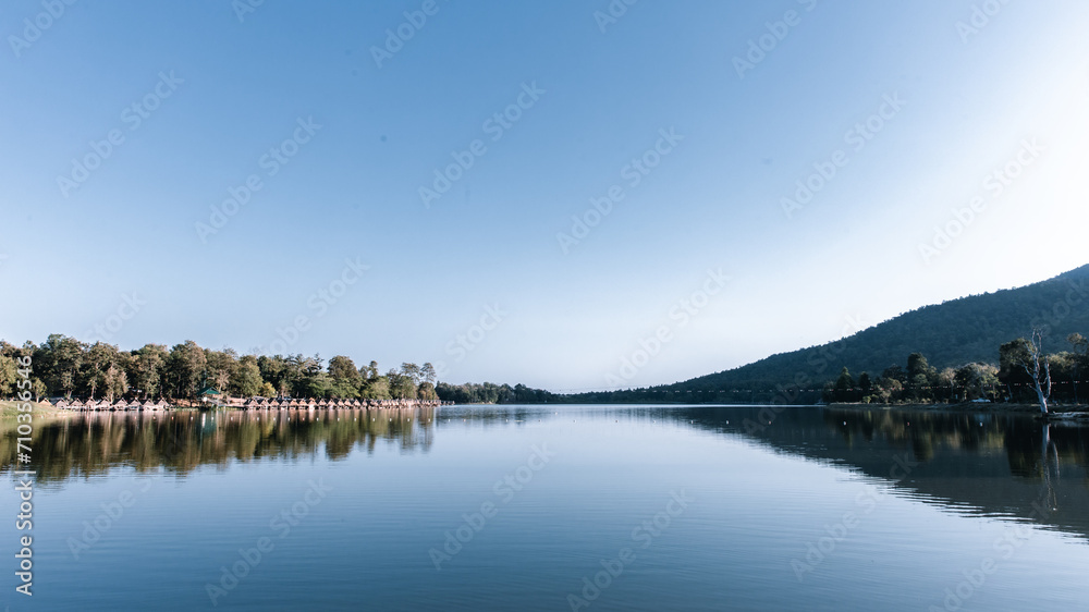 Fototapeta premium lake and mountains in clear sky weather. Huay Tueng Thao. thailand.