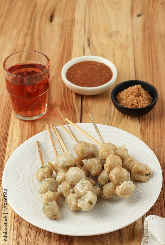 Cilok Goreng Tusuk, Deep Fried Tapioca Balls Served with Peanut Sauce and Spicy Powder Cilok Goreng Tusuk, Deep Fried Tapioca Balls Served with Peanut Sauce and Spicy Powder