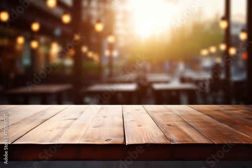 Wooden table in cafe restaurant with bokeh