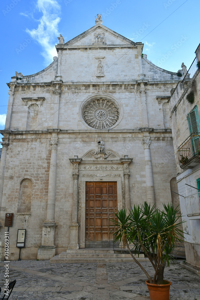 Facade of an old church in Monopoli, a town in the province of Bari, Itay.
