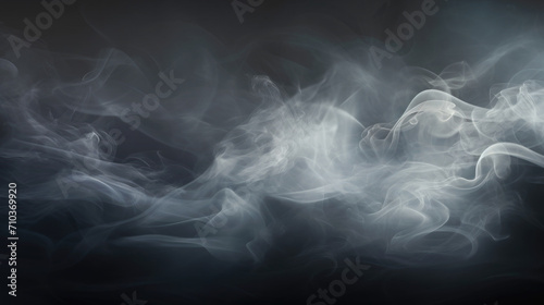 Abstract sunlight shining on a cloud of smoke on a black background.