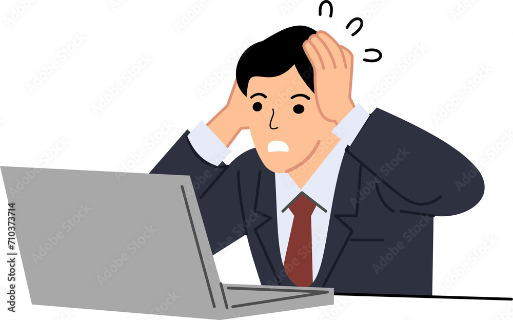 A employee holds his head while looking at a laptop or Tired worker A employee holds his head while looking at a laptop or Tired worker