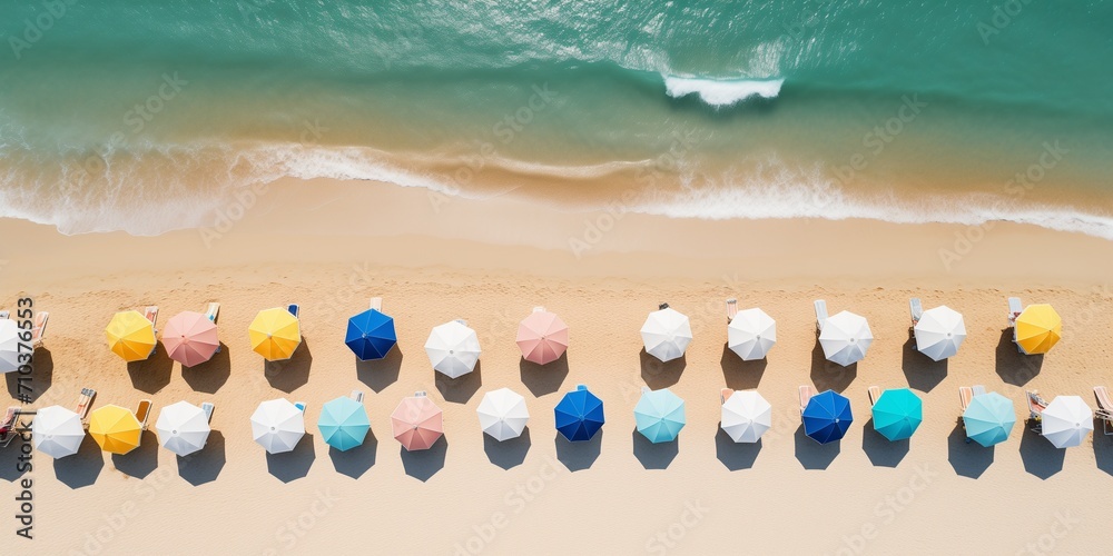 Aerial view to colorful beach with umbrellas Aerial view to colorful beach with umbrellas