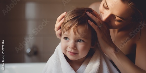 Mom bathes and wipes the child. Care for children