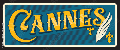 Cannes city of the French Riviera, commune in France. Vector travel plate, vintage tin sign, retro vacation postcard or journey signboard. Plaque from Europe tour, card with fleur de lis and wing