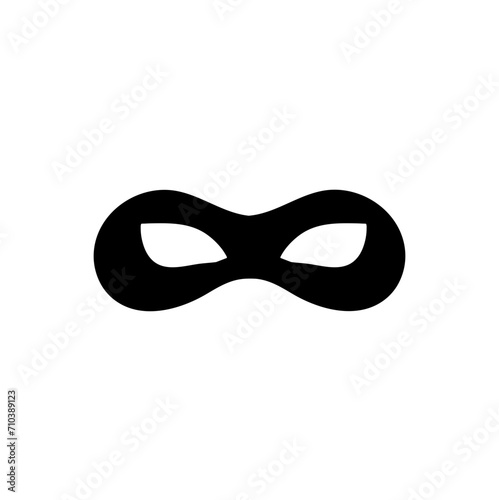 Silhouette of a masked superhero carnival villain