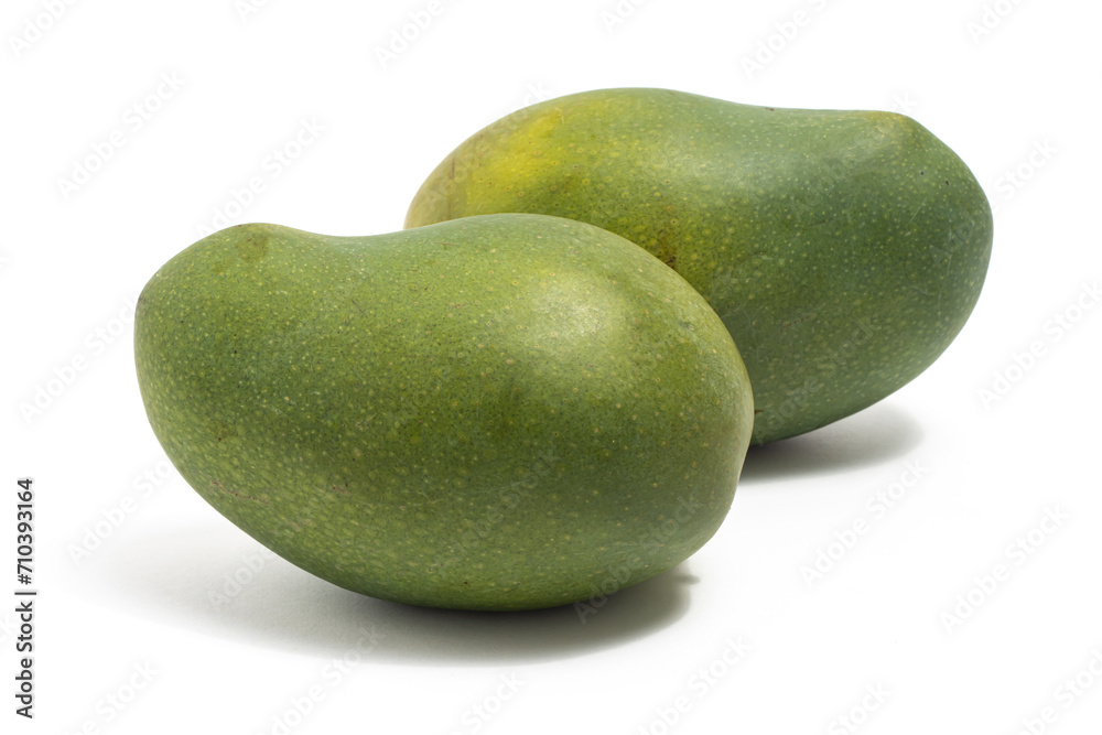 Two fresh organic green mango delicious fruit side view isolated on white background clipping path Two fresh organic green mango delicious fruit side view isolated on white background clipping path