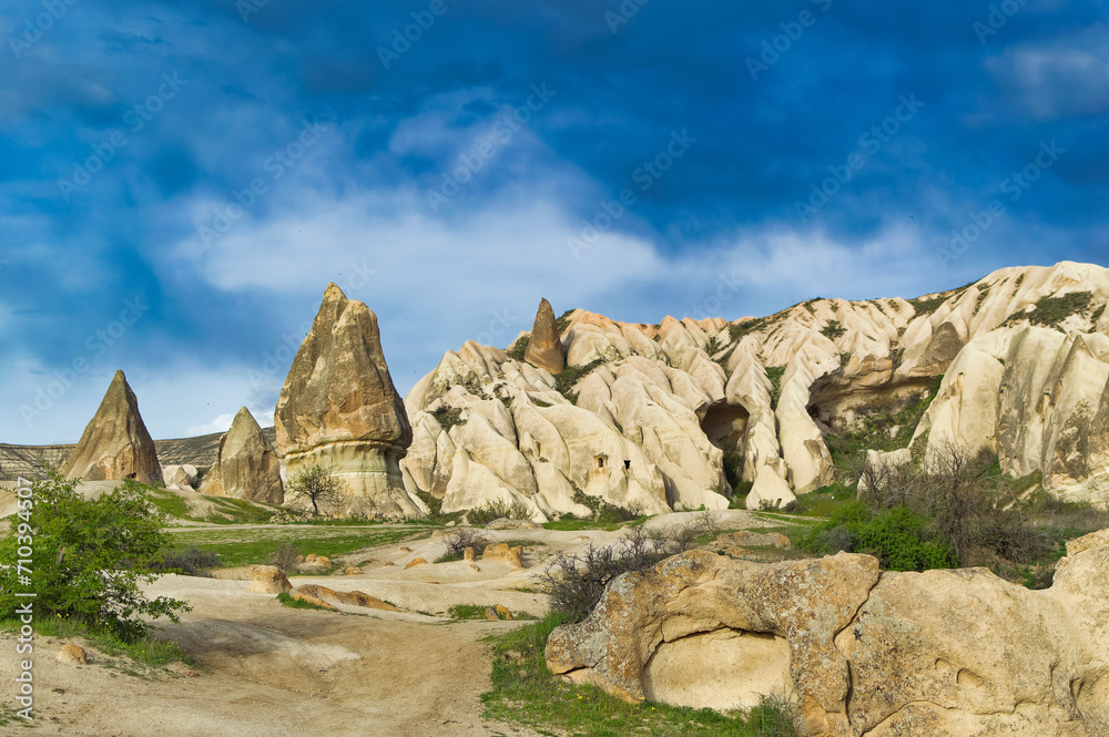 Typical Cappadocia landscape soft volcanic rock, shaped by erosion in Goreme, Turkey.