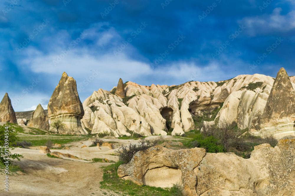 Typical Cappadocia landscape soft volcanic rock, shaped by erosion in Goreme, Turkey.