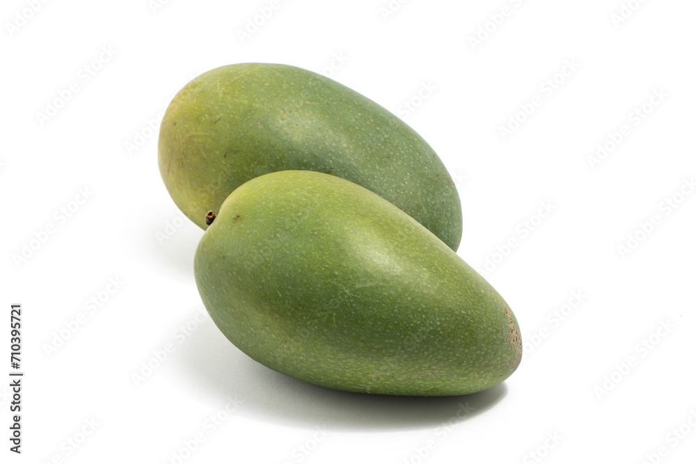 Two fresh organic green mango delicious fruit side view isolated on white background clipping path Two fresh organic green mango delicious fruit side view isolated on white background clipping path