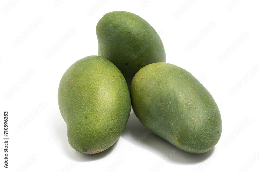 Three fresh organic green mango delicious fruit side view isolated on white background clipping path Three fresh organic green mango delicious fruit side view isolated on white background clipping path