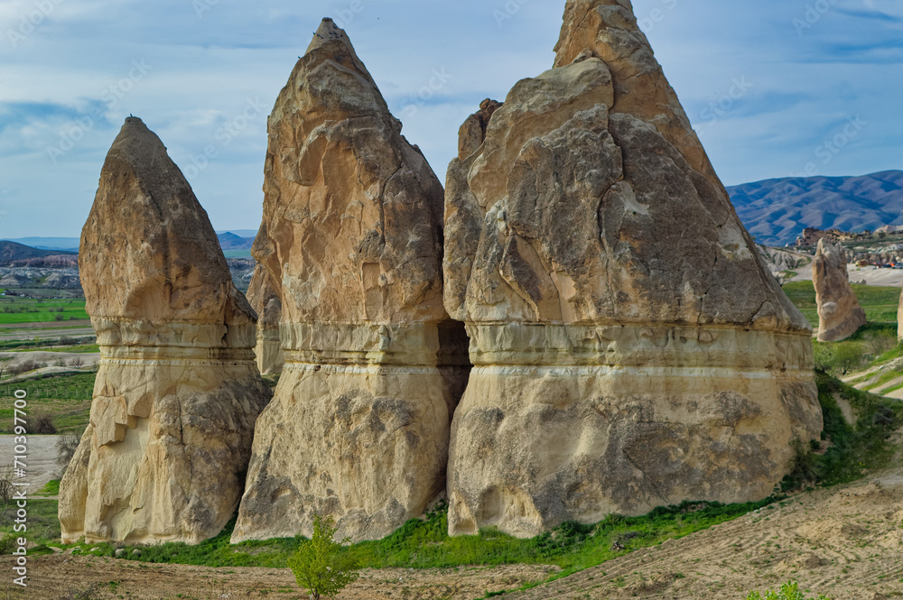 Typical Cappadocia landscape soft volcanic rock, shaped by erosion in Goreme, Turkey.