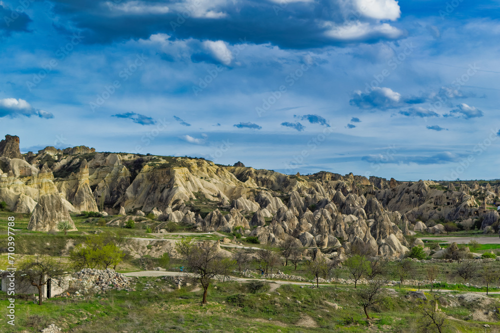 Typical Cappadocia landscape soft volcanic rock, shaped by erosion in Goreme, Turkey.