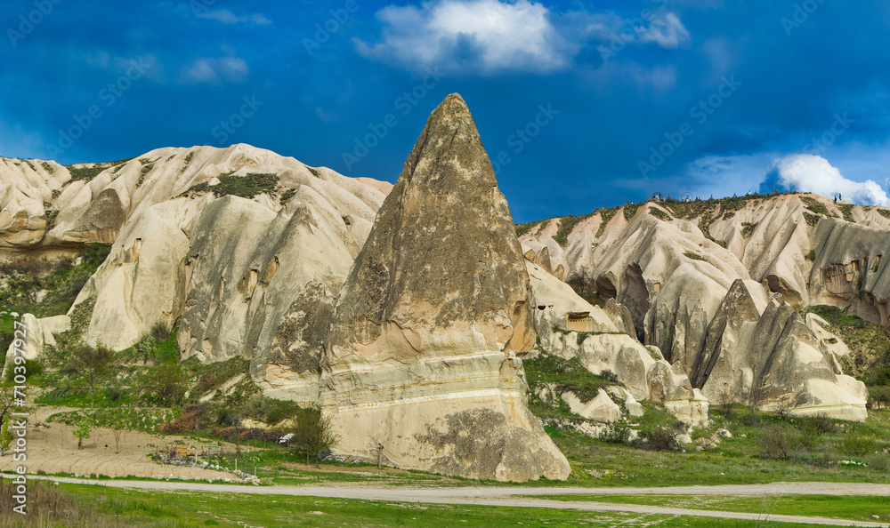 Typical Cappadocia landscape soft volcanic rock, shaped by erosion in Goreme, Turkey.
