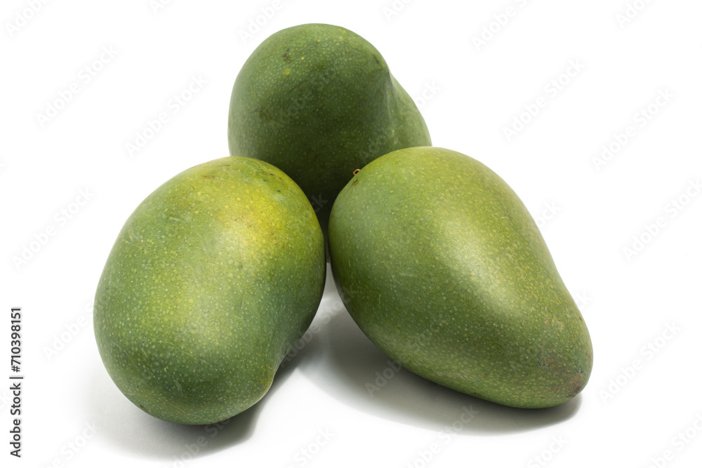 Three fresh organic green mango delicious fruit side view isolated on white background clipping path Three fresh organic green mango delicious fruit side view isolated on white background clipping path