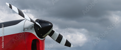 Banner Part of an Oldtimer light aircraft against a stormy sky. Copy space. Body slightly modified photo