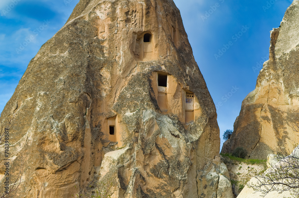 Typical Cappadocia landscape soft volcanic rock, shaped by erosion in Goreme, Turkey.