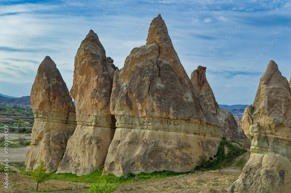 Typical Cappadocia landscape soft volcanic rock, shaped by erosion in Goreme, Turkey.