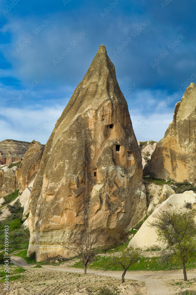 Typical Cappadocia landscape soft volcanic rock, shaped by erosion in Goreme, Turkey.